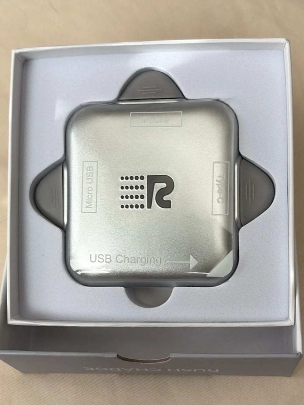 Silver 4-in-1 Portable Power Bank with Built-In Connectors